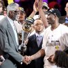 Kobe+receives+Finals+MVP+trophy+from+Bill+Russell.jpg